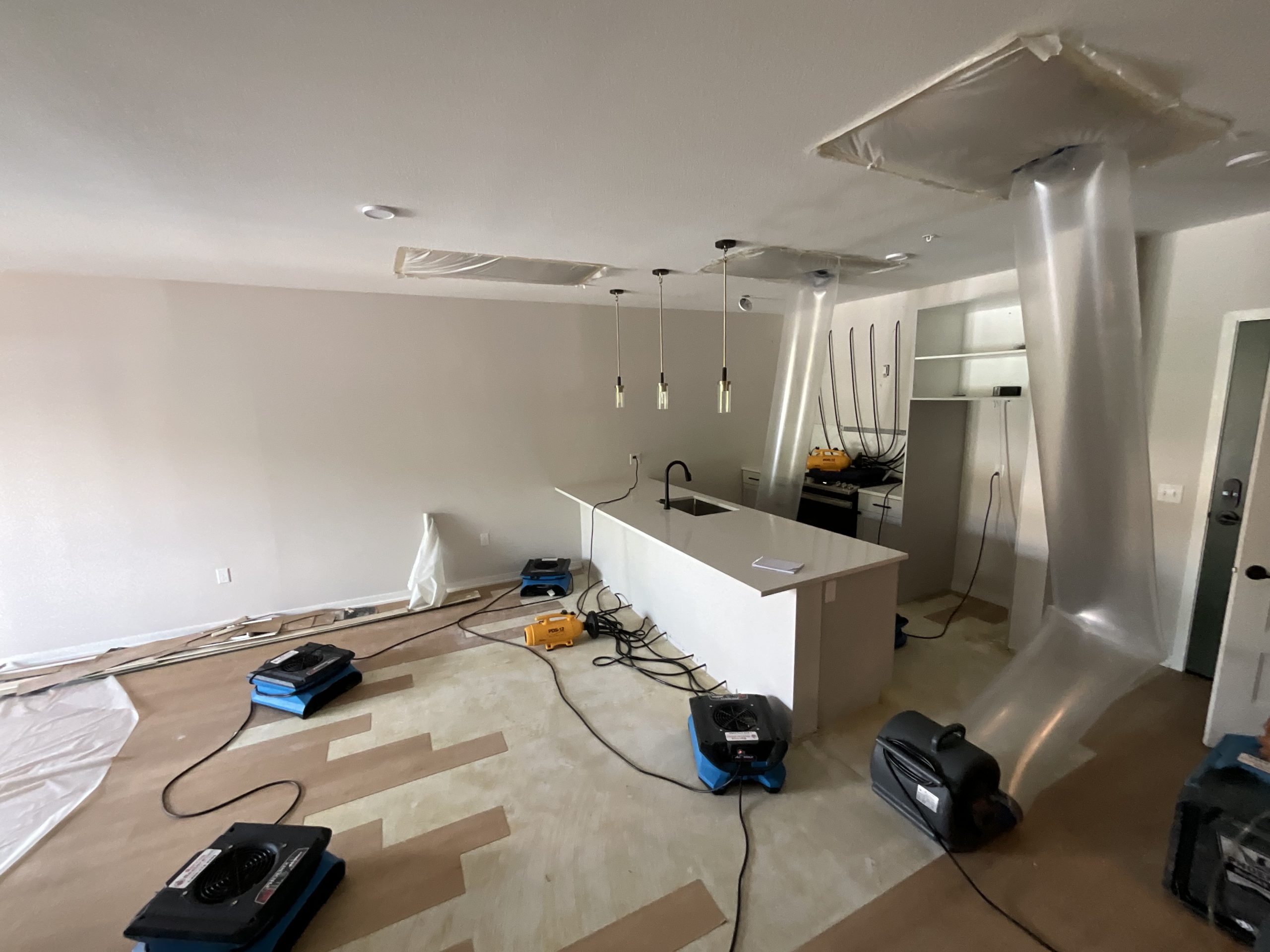 Water Damage From Broken Sprinkler Line Cleanup in Apartment Building | Service Restoration